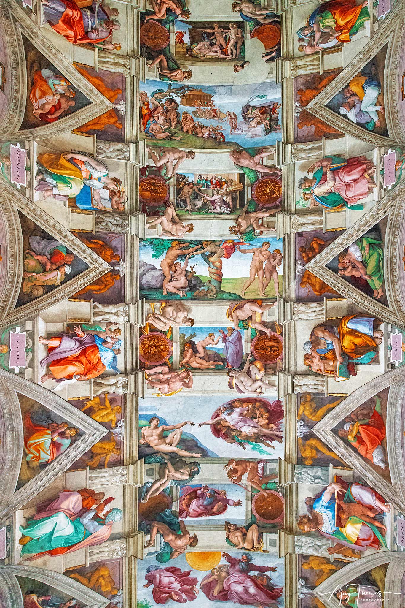 This photograph captures Michelangelo's original paintings from the Sistine Chapel ceiling in Vatican City, showcasing the masterful...
